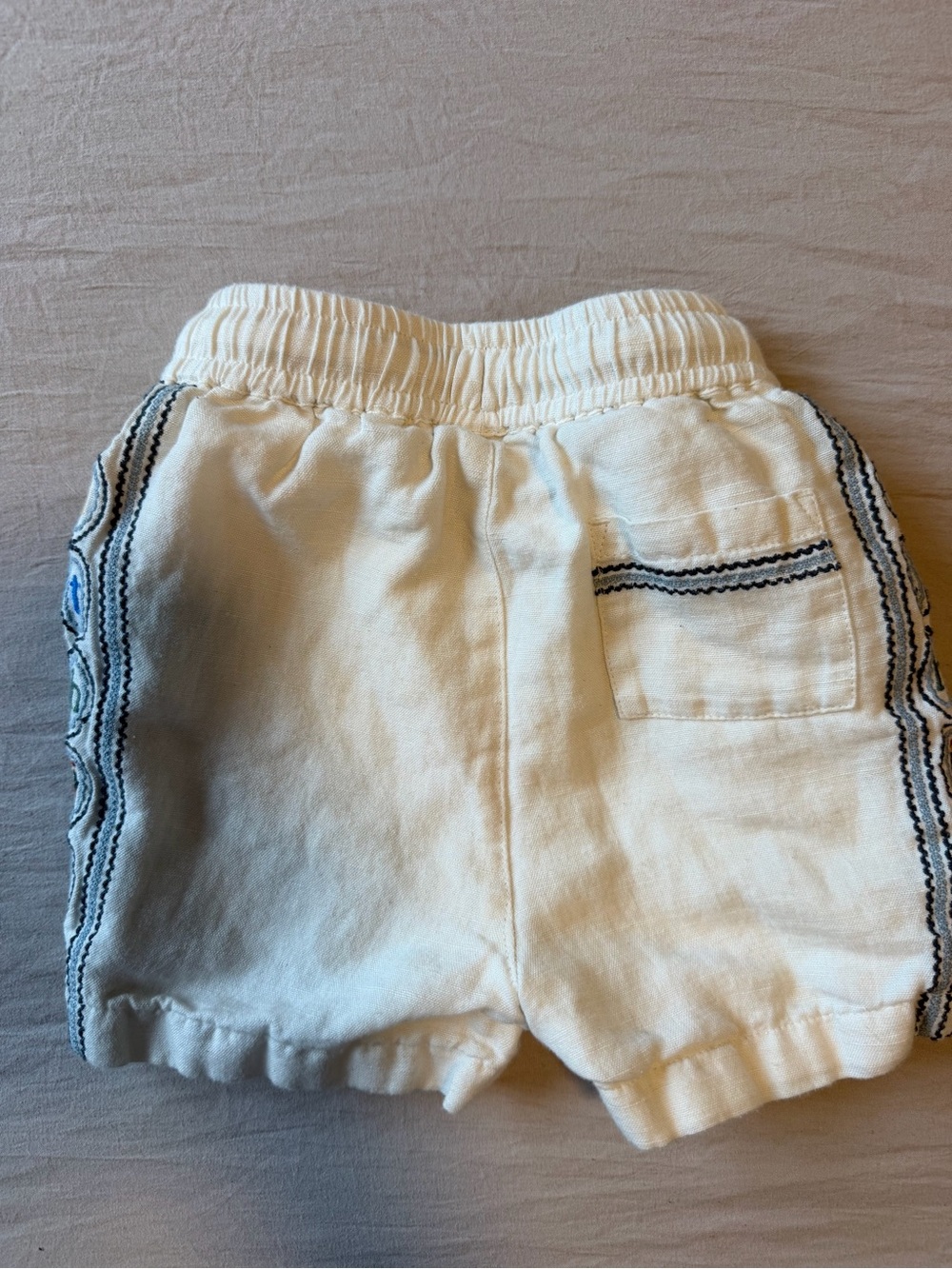 Kith Cream Off-White Kids Drawstring Shorts with Navy Trim - Picture 3 of 3